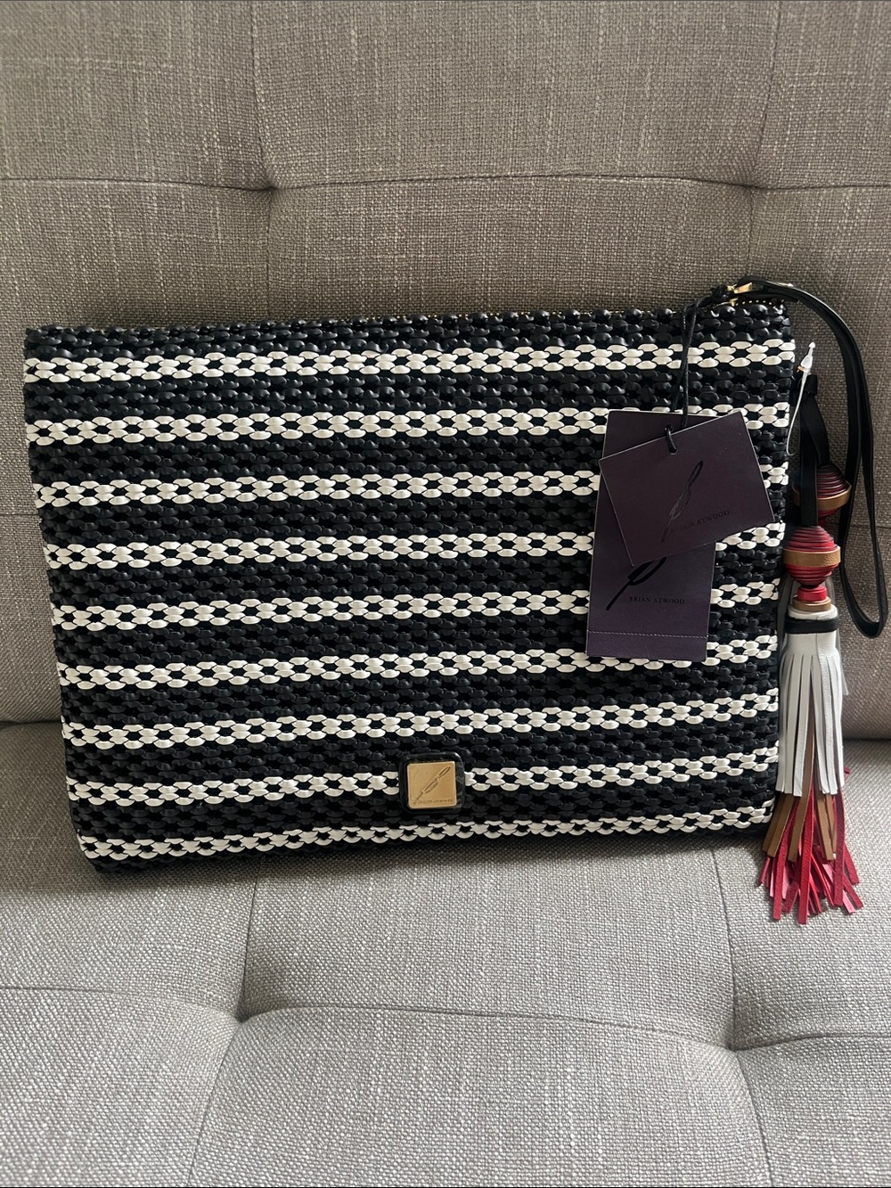 Brian Atwood black & white woven clutch-NWT-zip closure-tassels